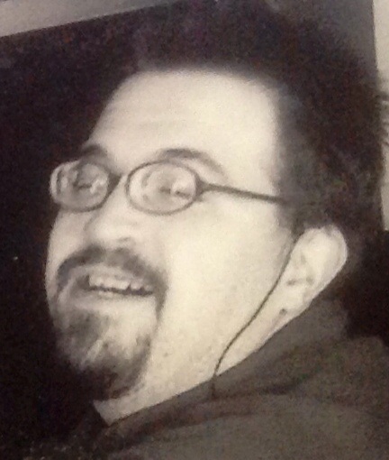 After ruling out that he was wearing an iPod or hearing device, it was clear that we were dealing with a late 1980s fashion sense...