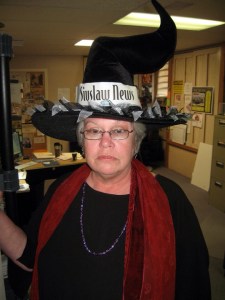 If not for the hat, she would be through her new door even faster.