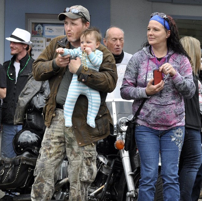One of my favorite things about being on Bay Street for the parade is watching local families and bikers watch the parade together