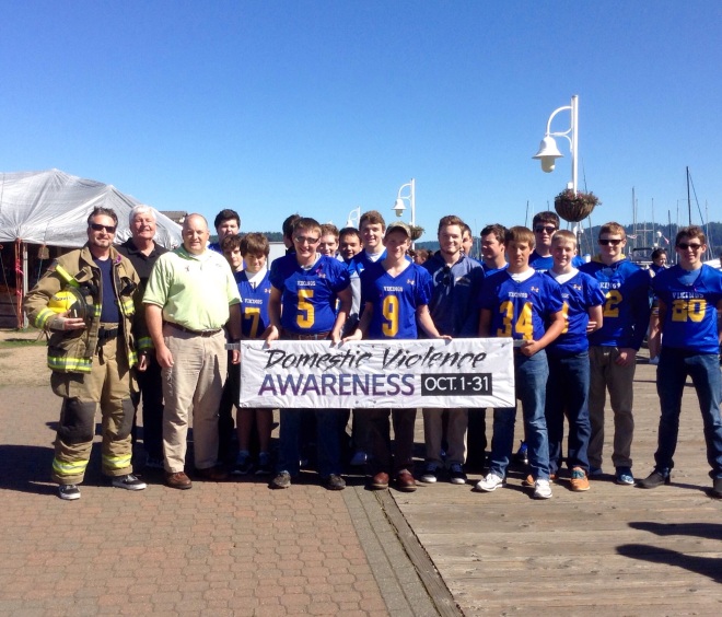 Representing my fellow fire department volunteers, along with Siuslaw Outreach Services executive director David Wiegan, assistant football coach Bob Teeter and team members, we march to show support for victims of abuse and the importance of awareness in every community. 